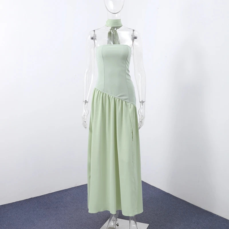 Vestido Longo Elegante com Recortes e Estampa Patchwork
